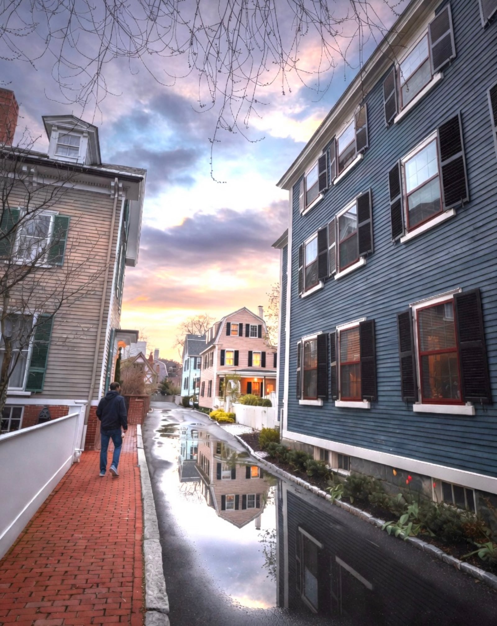 Federal Street historic district at dusk with Federal-style mansions glowing orange in Salem MA
