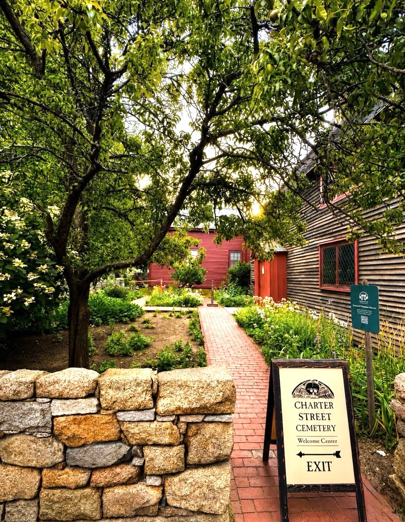 Brick garden path beside the First Period Samuel Pickman House at the Charter Street Cemetery Welcome Center, Salem MA