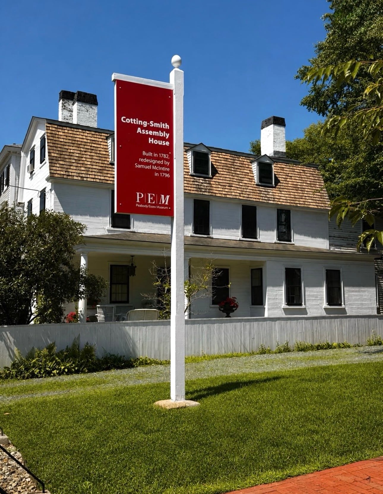 The white Federal-style Cotting-Smith Assembly House (built 1782, redesigned by Samuel McIntire in 1796), a Peabody Essex Museum historic house in Salem MA
