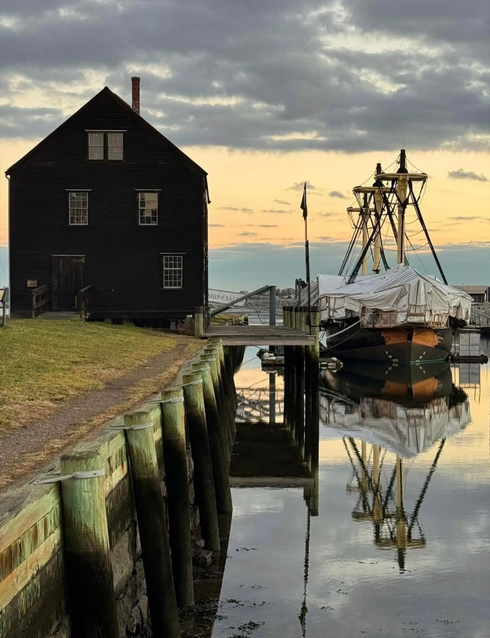 The Friendship of Salem tall ship docked at Derby Wharf at sunset, Salem MA