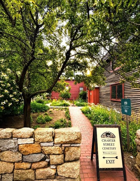 Brick garden path beside the First Period Samuel Pickman House at the Charter Street Cemetery Welcome Center, Salem MA