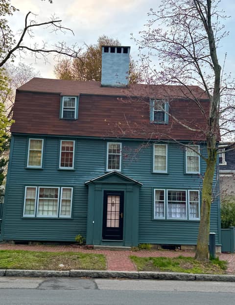 Preserved 18th-century colonial architecture on a tree-lined street in Salem MA