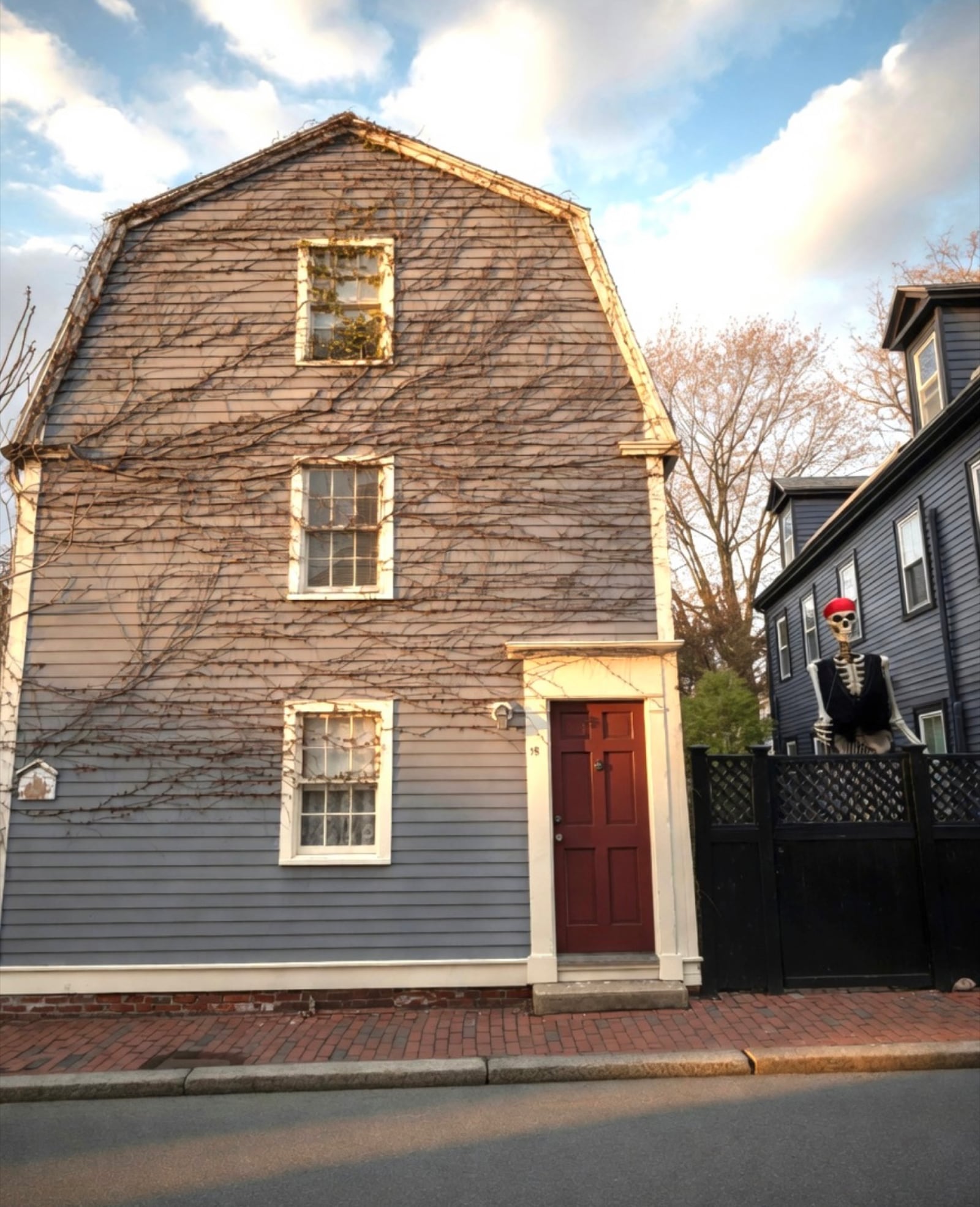 Ivy-covered Salem home decorated with gothic and Halloween décor year-round